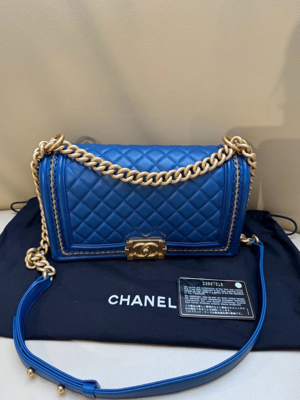 CHANEL Blue Quilted Boy Flap Bag with Gold Chain Strap